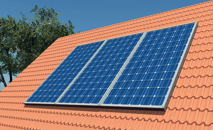 solar panels on red roofed house