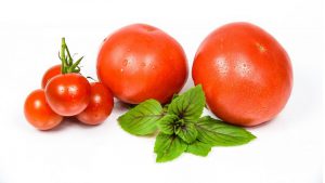 A picture of a bunch of ripe tomato fruits