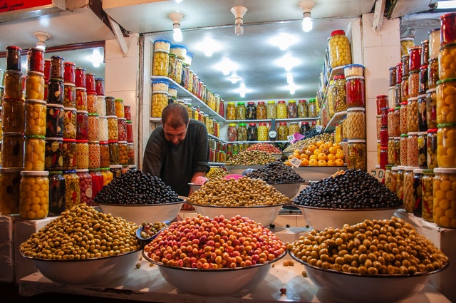 A modern grocery shop stocking various fruits and berries