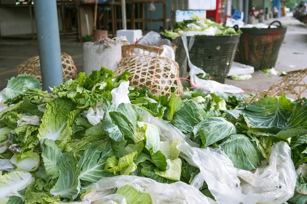 Pile of vegetable throw away as garbage at fresh-food market 
