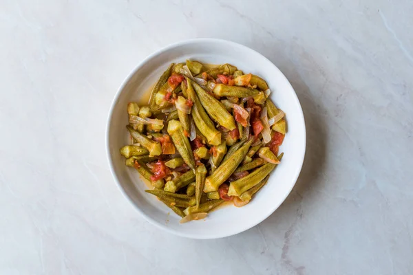 Turkish Food Okra Dish with Tomatoes and Onion Slices / Bamya. Traditional Organic Food.