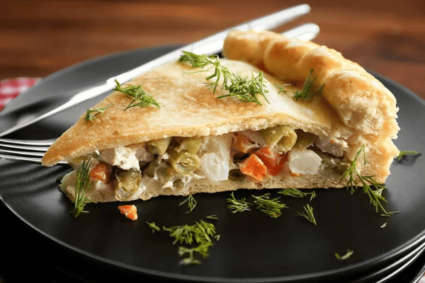Piece of vegetable pie with rice and okra,